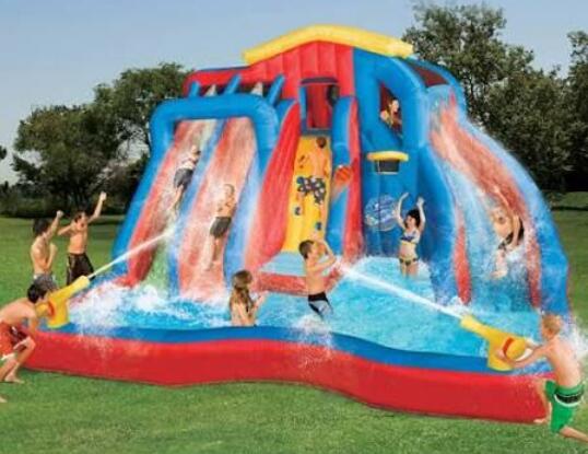 KIDS PLAYING WATER SLIDES